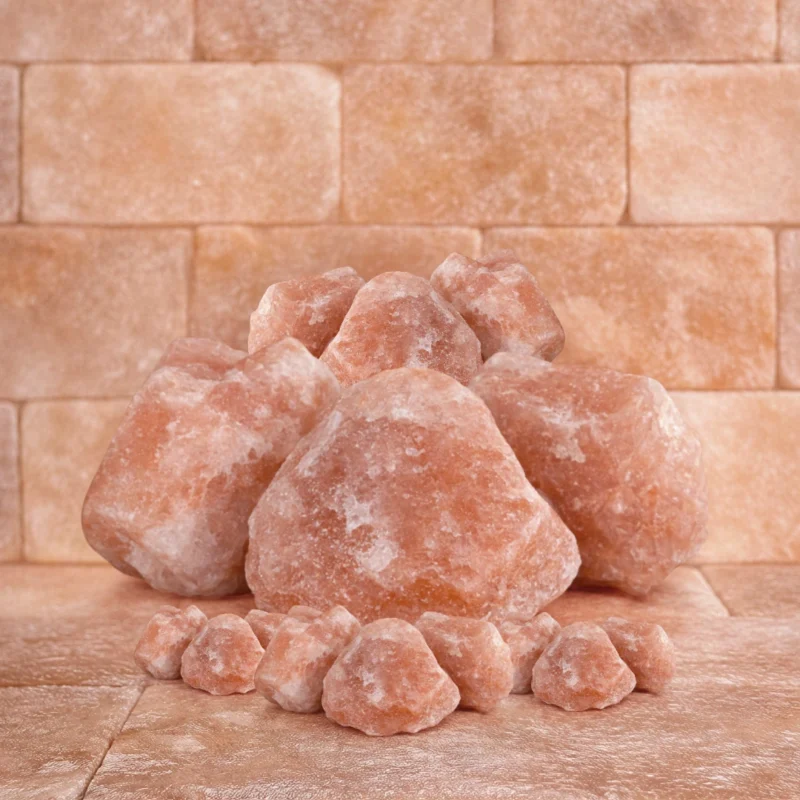 Różowe bryłki z różowej soli himalajskiej podświetlone w gabionie w nowoczesnej grocie solnej Różowe bryłki z różowej soli himalajskiej podświetlone w gabionie w nowoczesnej grocie solnej